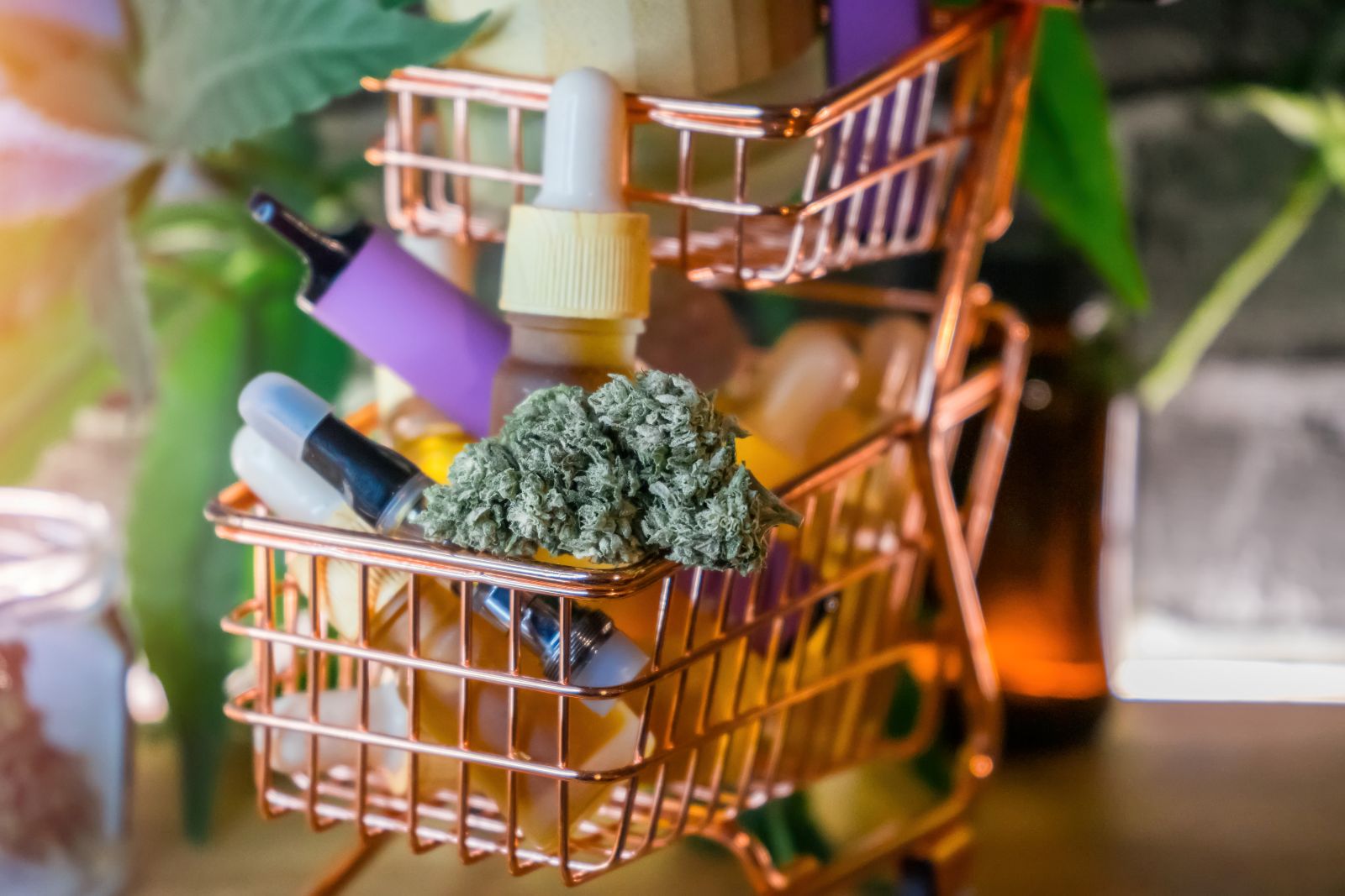 mini shopping cart with various cannabis products in it